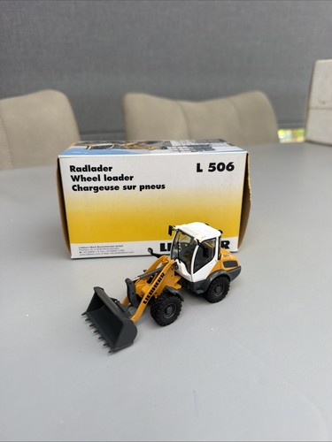 Liebherr 506 loading - 506, shovel